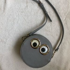 Round googly eye crossbody bag